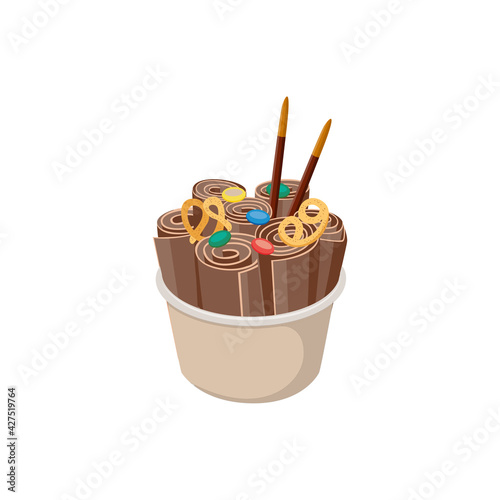 Chocolate ice cream roll - dessert food in bowl decorated with candy sprinkle