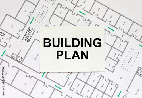 Business card with text Building Plan on a construction drawing