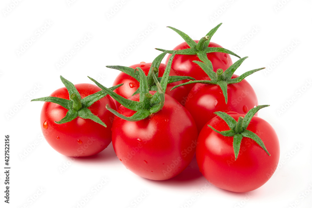 Ripe red cherry tomatoes isolated on white. Cocktail tomatoes with green plant stems Ripe red cherry tomatoes isolated on white. Cocktail tomatoes with green plant stems