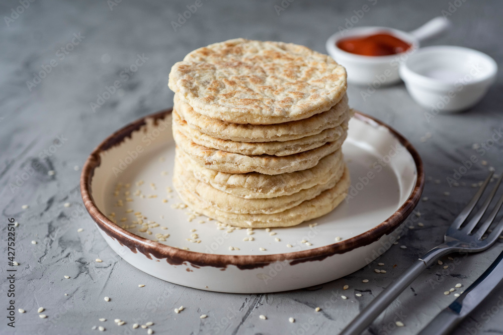 Vegetarian rice cakes on a white plate on a gray background Vegetarian rice cakes on a white plate on a gray background