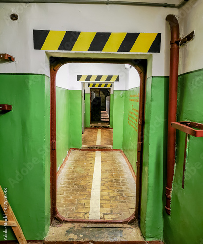 Door in an undergroud nuclear weapon launch site in Lithuania, abandoned base in Plokstine photo