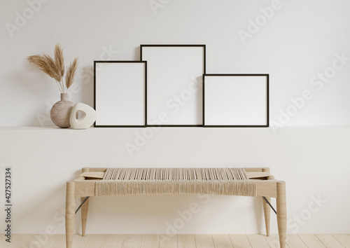 Three 8x10 Vertical and Horizontal Black Frame mockup with decorations on white wall. 3D Rendering
