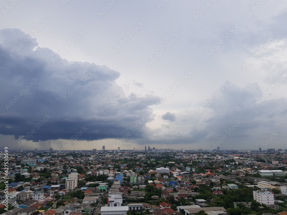 Rain clouds are falling far in the city. Rain clouds are falling far in the city.