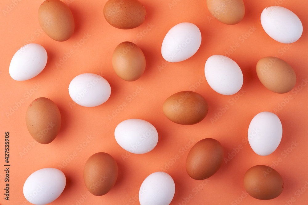Flat lay white and brown chicken eggs. Flat lay white and brown chicken eggs.