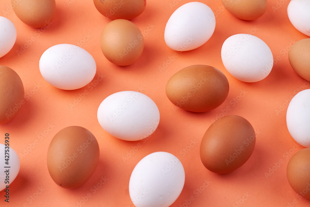 Group of white and brown raw chicken eggs. Group of white and brown raw chicken eggs.