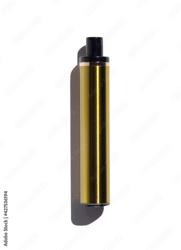 Disposable e-cigarette in gold color on white isolated background. The concept of modern smoking, vaping and nicotine. Top view Disposable e-cigarette in gold color on white isolated background. The concept of modern smoking, vaping and nicotine. Top view