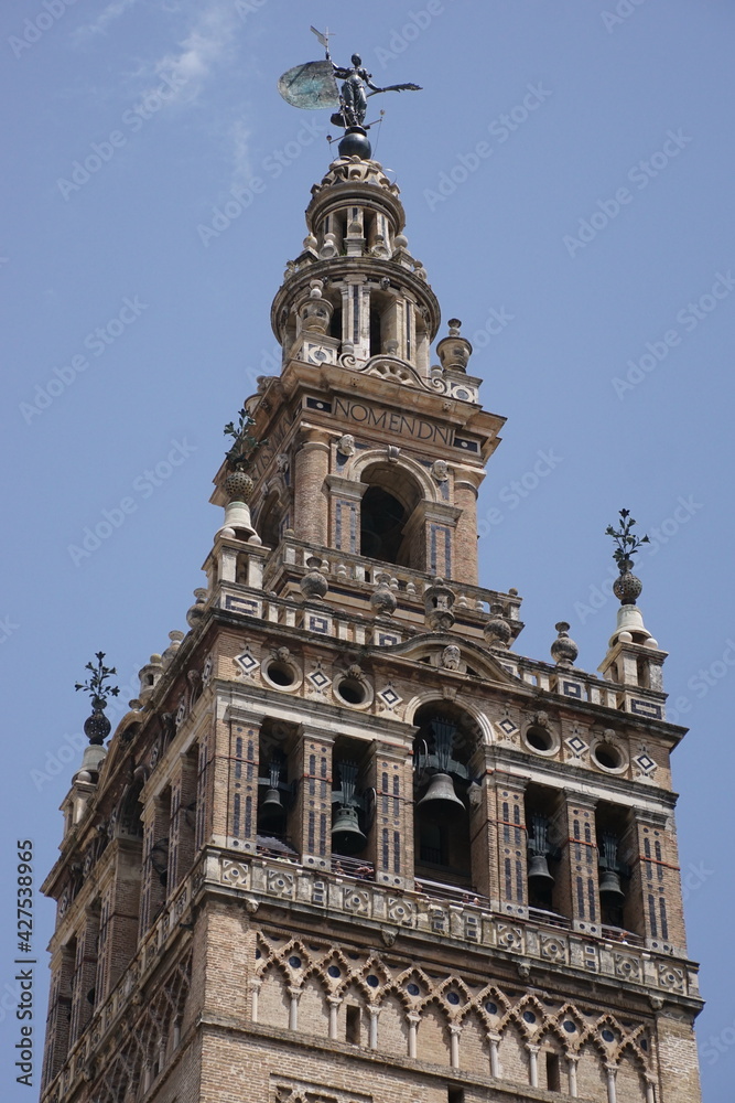 Famous tower of Giralda, Islamic architecture built by the Almohads and crowned by a Renaissance bell tower with the statue of Giraldillo at its highest point.