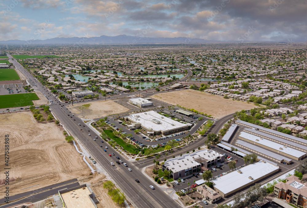 Aerial overlooking desert small town a Avondale city of beautiful highway Arizona on the mountain with traffic line in Interstate expressway near Phoenix AZ US