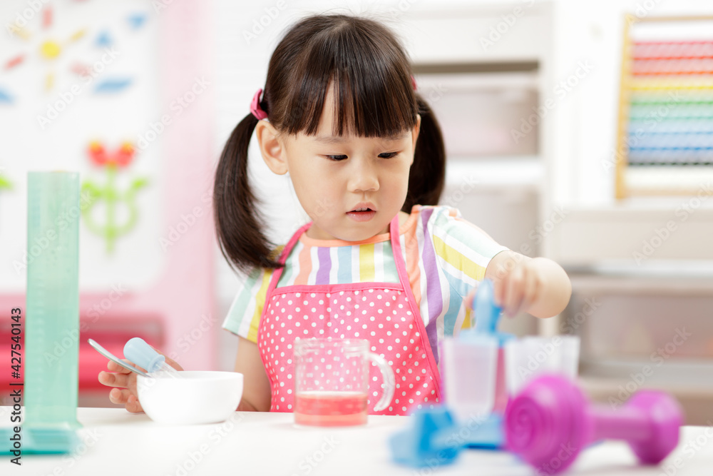 young girl making sweet gems for homeschooling young girl making sweet gems for homeschooling