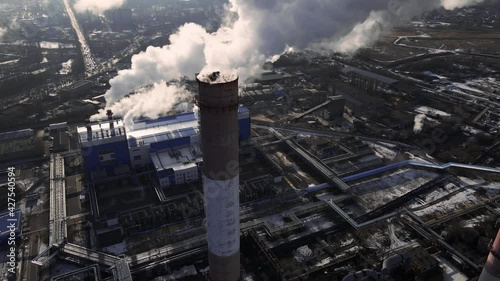 Emission carbon gases from factory pipes with smoke in atmosphere. Industrial factory pollution ecology and air. Factory emission smoke