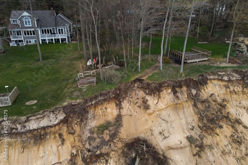 aerial view of home near eroding dune on Lake Michigan