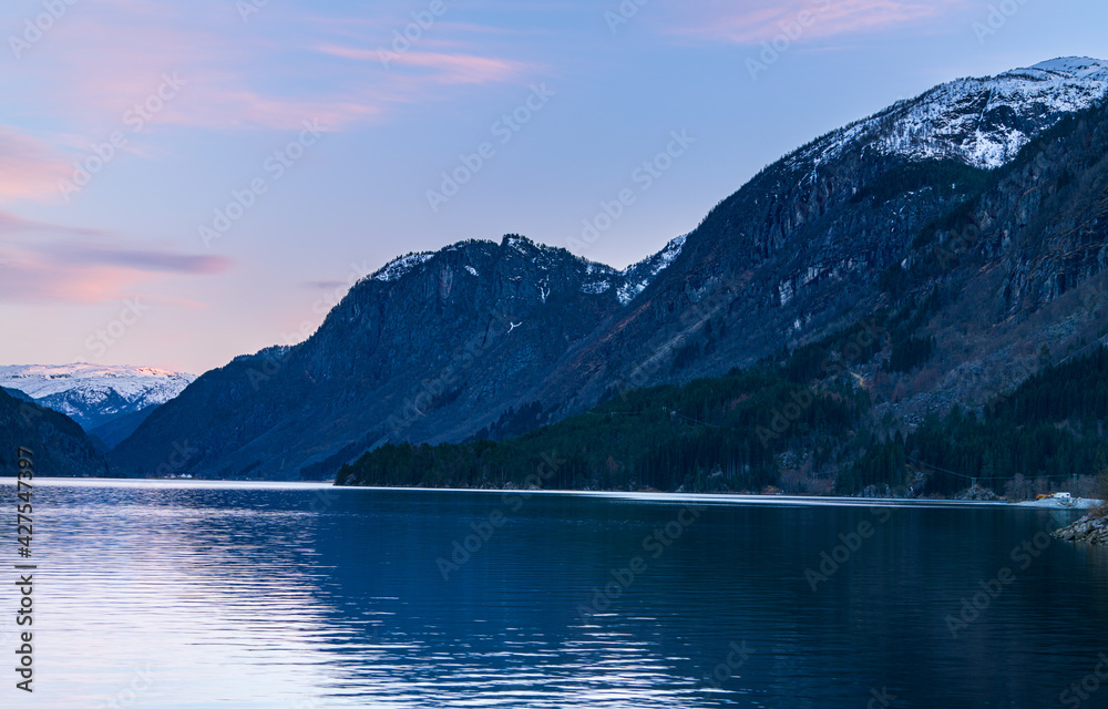 Sunset over Lake Sandvinvatnet from a campground in the town of Odda