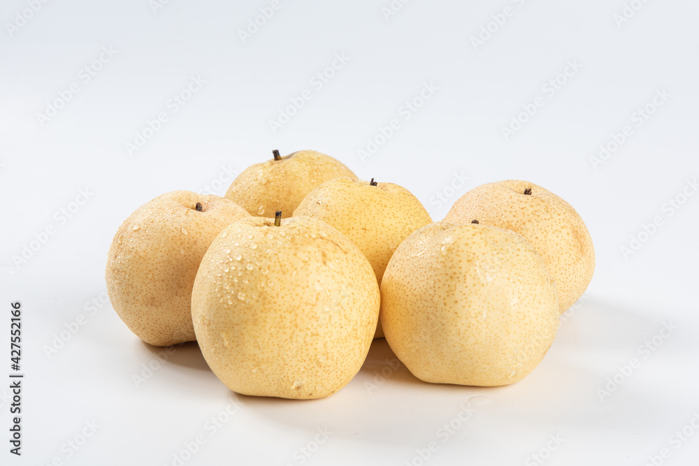 close-up of fresh yellow pear isolated on white background close-up of fresh yellow pear isolated on white background