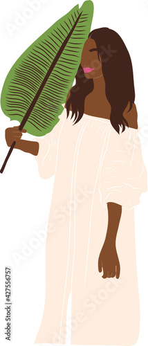 Minimal Woman Portrait holding tropical leaf