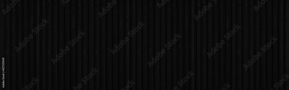 Panorama of Black Corrugated metal background and texture surface or galvanize steel Panorama of Black Corrugated metal background and texture surface or galvanize steel