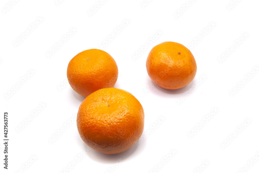 several tangerines on a white background several tangerines on a white background