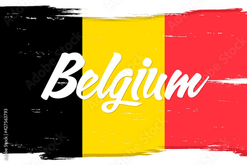 Belgium flag, banner with grunge brush. Independence Day. National tricolor in original colors.
