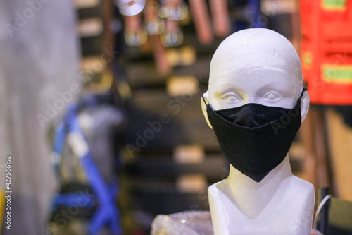Covid protection black cloth facemask in model