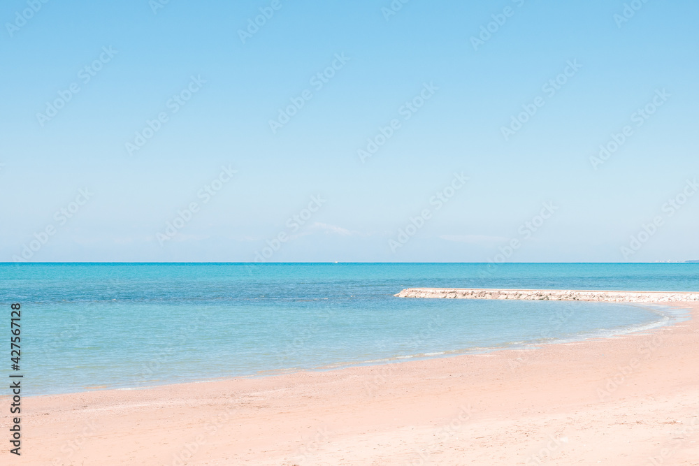 Beautiful landscape with white sand beach. Panoramic view on blue sky and azure coast sea on natural background. Luxury summer vacation