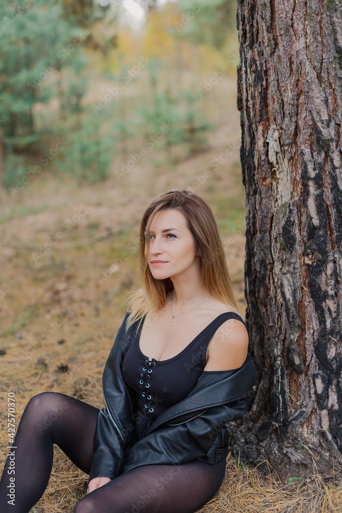 Beautiful woman portrait in forest in autumn. Beautiful woman portrait in forest in autumn.