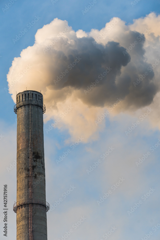 Smoking factory chimneys with co2 emissions.Environmental problem of environmental and air pollution.Climate change,ecology, global warming.The sky is smoky with toxic substances.Soot from factories Smoking factory chimneys with co2 emissions.Environmental problem of environmental and air pollution.Climate change,ecology, global warming.The sky is smoky with toxic substances.Soot from factories