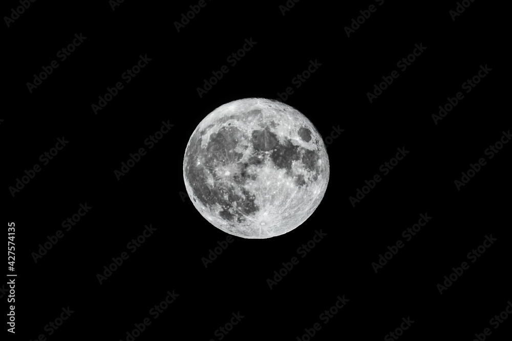 Super fool moon on black background, detailed image Super fool moon on black background, detailed image