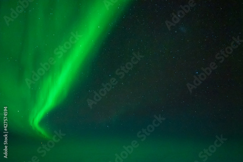 Aurora display from a plane window