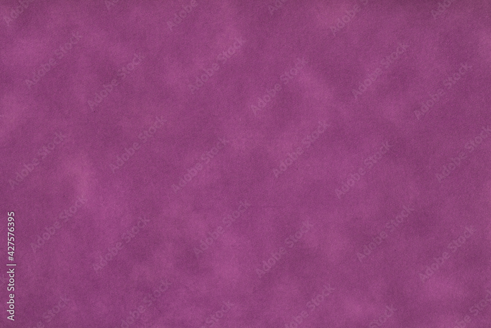 Fototapeta premium Texture of dark purple old paper, crumpled background. Vintage lilac grunge surface backdrop.