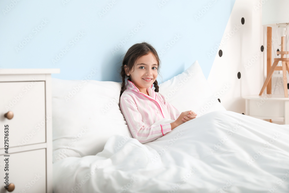 Morning of cute little girl in bed Morning of cute little girl in bed