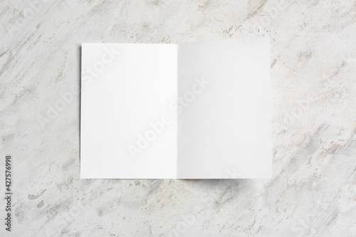 Blank brochure on light background © Pixel-Shot