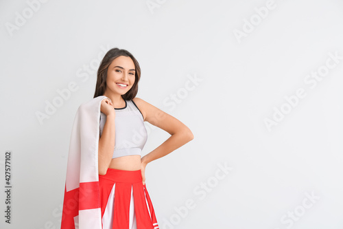 Beautiful cheerleader with ...