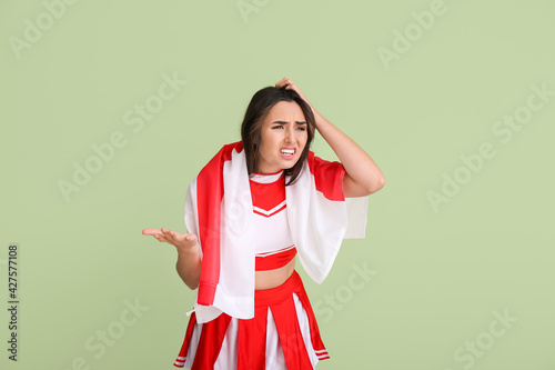 Upset cheerleader with the ...
