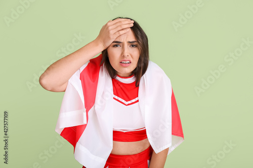Upset cheerleader with the ...