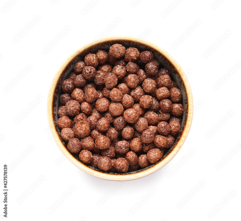 Bowl with chocolate corn balls on white background