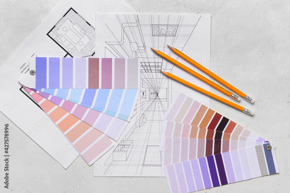 Plan of house, color samples and pencils on light background Plan of house, color samples and pencils on light background