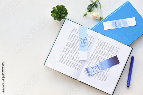 Books with bookmarks and fl...