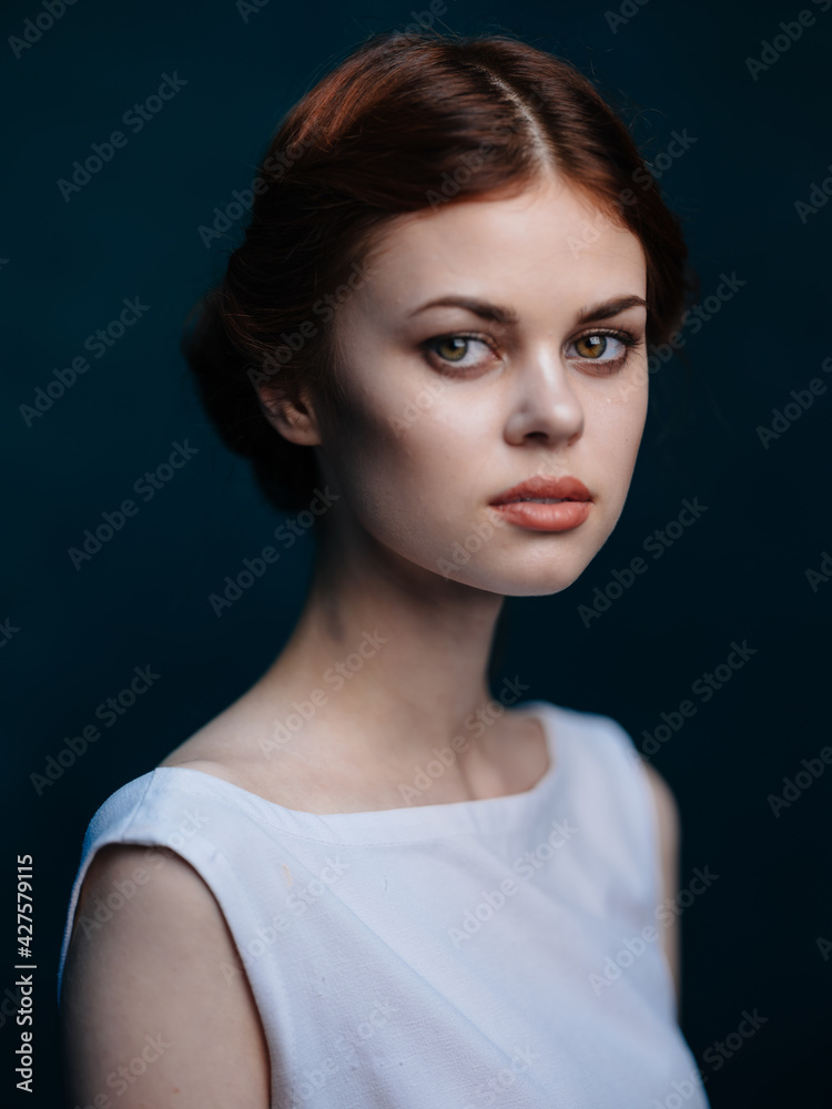 Attractive woman red hair white dress hairstyle model Attractive woman red hair white dress hairstyle model