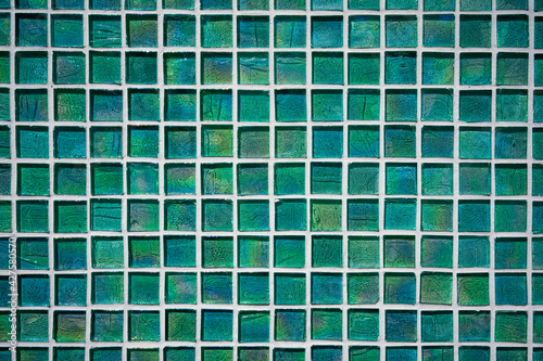 Emerald green mosaic tile wall