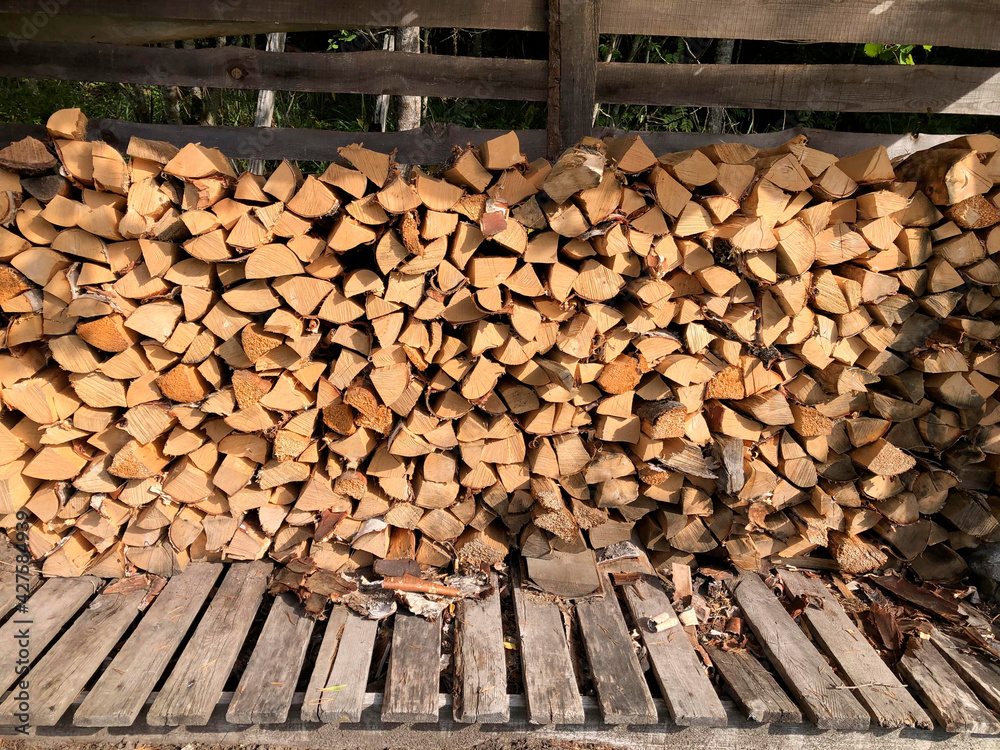 sawn and chopped softwood firewood lay folded. sawn and chopped softwood firewood lay folded.
