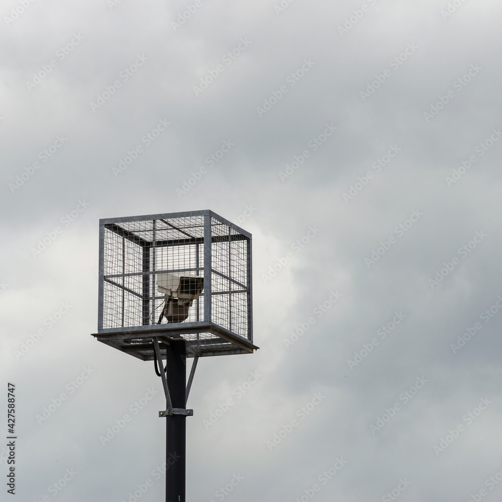 CCTV camera in a cage CCTV camera in a cage
