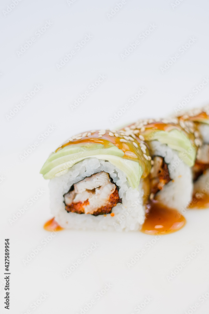 Japanese cuisine roll with avocado and sesame seeds Japanese cuisine roll with avocado and sesame seeds