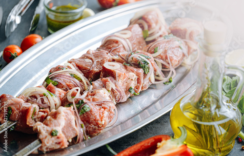 marinated meat for barbecue. Meat skewered and ready to grill