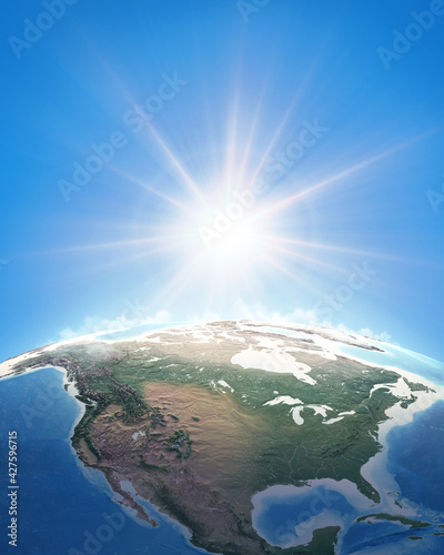Sun shining over a high detailed view of Planet Earth, focused on North America, USA and Canada. 3D illustration - Elements of this image furnished by NASA