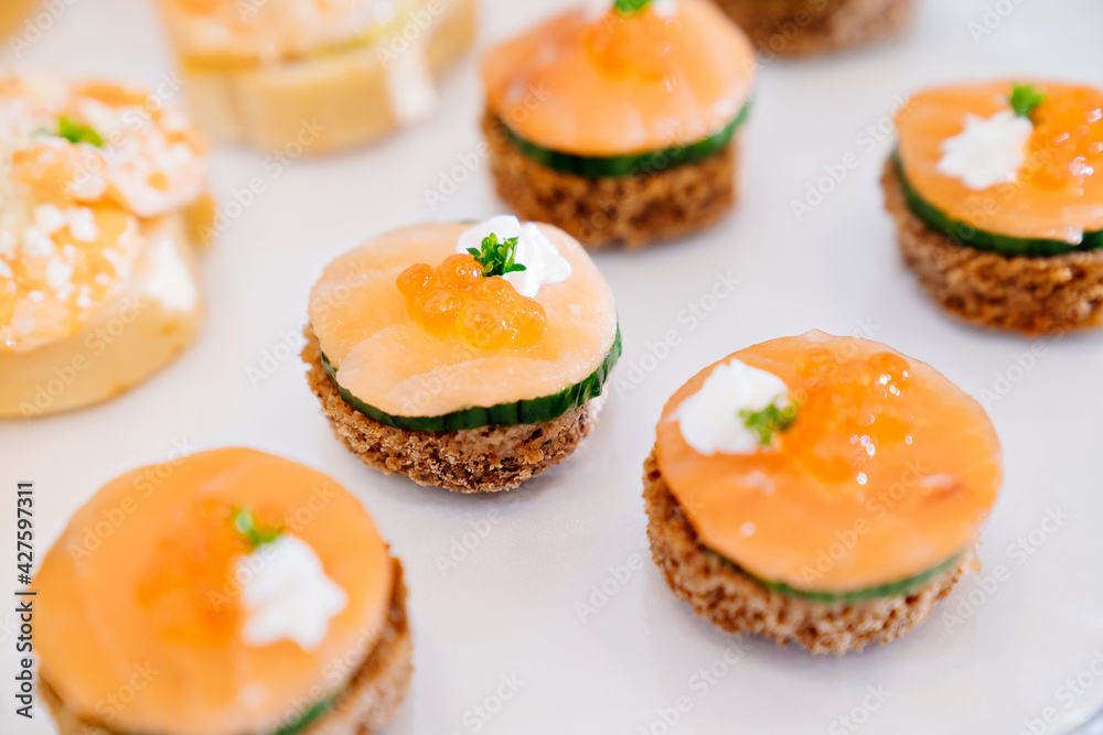 canapes. A convenient buffet feed. little sandwiches at the festival. Catering. delivery of ready meals and service of banquets. canapes. A convenient buffet feed. little sandwiches at the festival. Catering. delivery of ready meals and service of banquets.