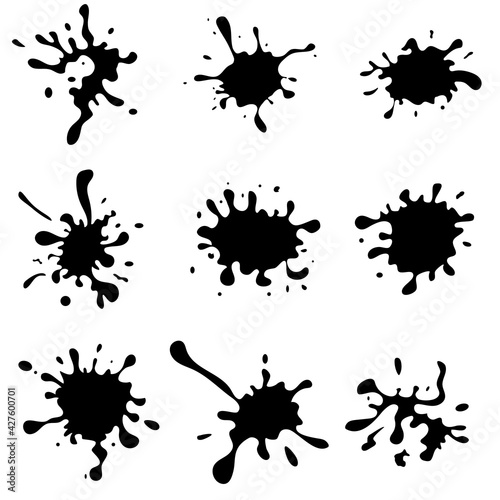 Black blots on a white background.Abstract blots, splashes and spots on a white background.Flat vector illustration.