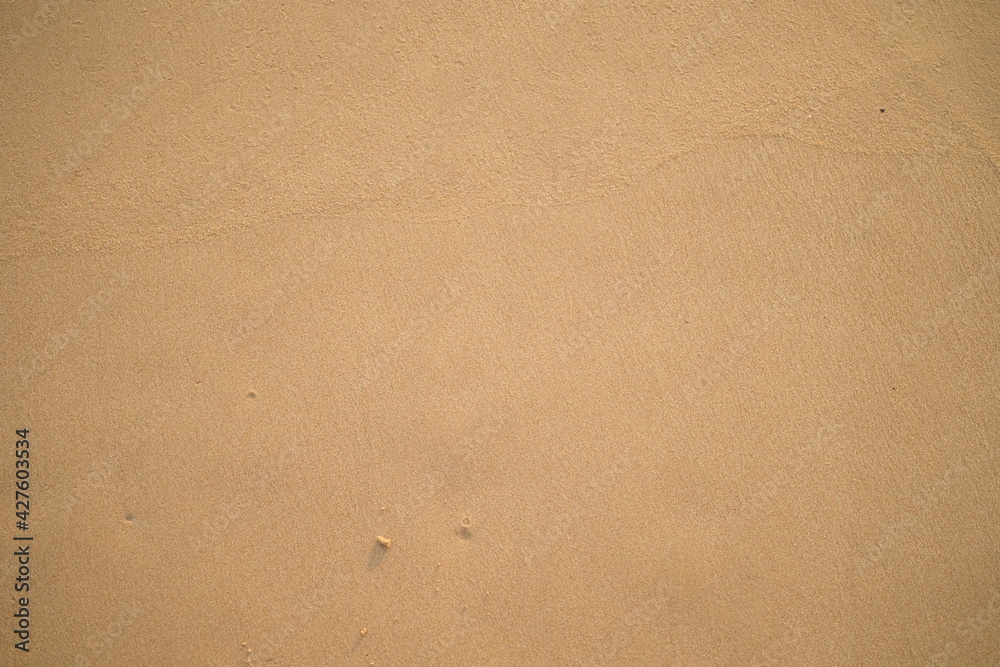 Natural brown sand background, surface and texture. Natural brown sand background, surface and texture.