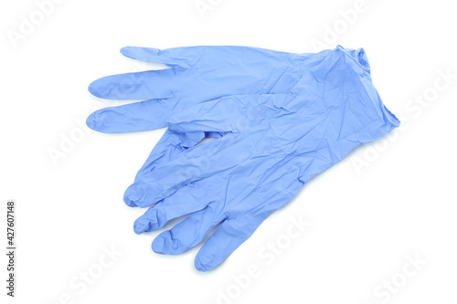 Blue medical gloves isolated on white background © Atlas