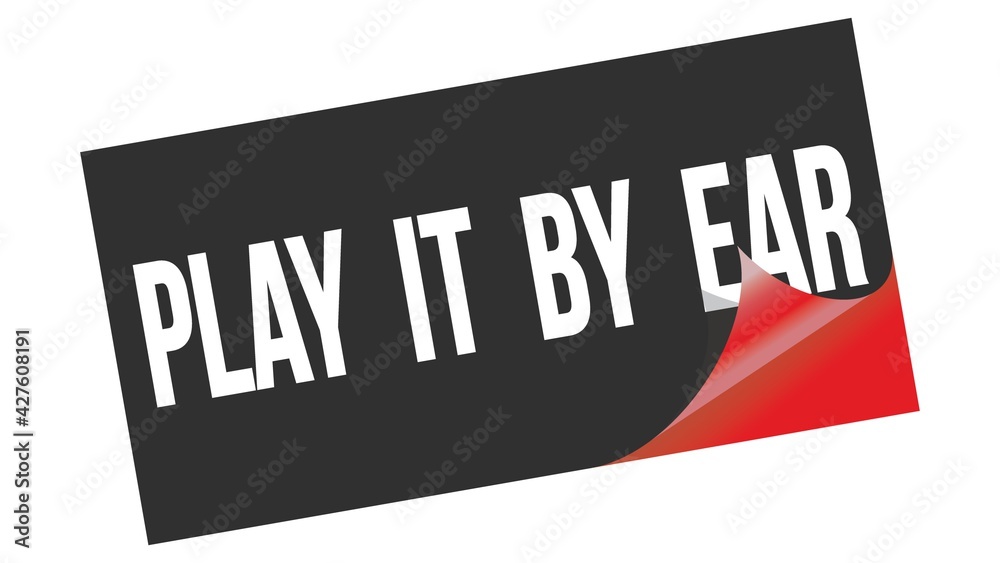 PLAY IT BY EAR text on black red sticker stamp. PLAY IT BY EAR text on black red sticker stamp.