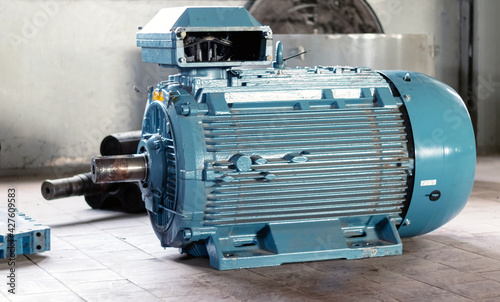 Industry. High power electric motor without belt pulley. Side view. Close-up.