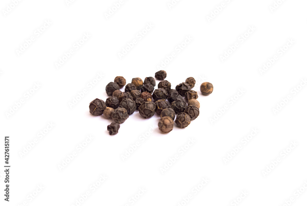 Black pepper on white isolated backgound Black pepper on white isolated backgound